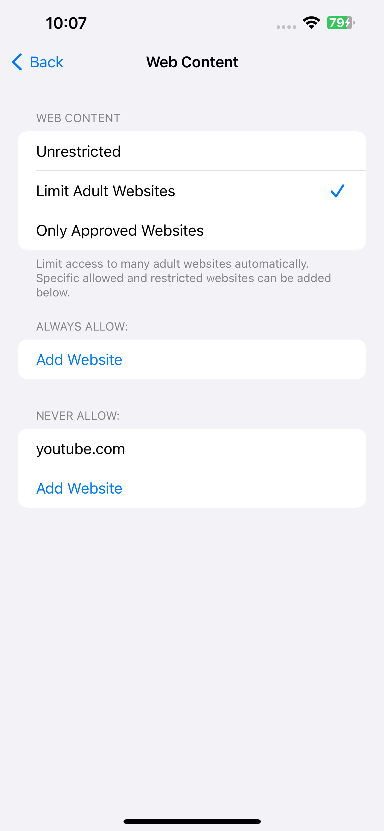 a screen showing that Limit Adult Websites is selected and youtube.com is added to the Never Allow section